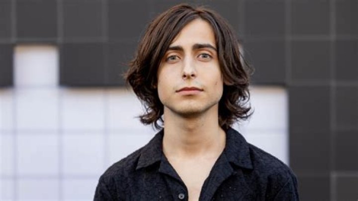 Aidan Gallagher's Height Journey Explored In 2024