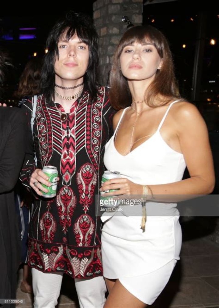 Unveiling The Enigmatic Woman Behind The Rockstar