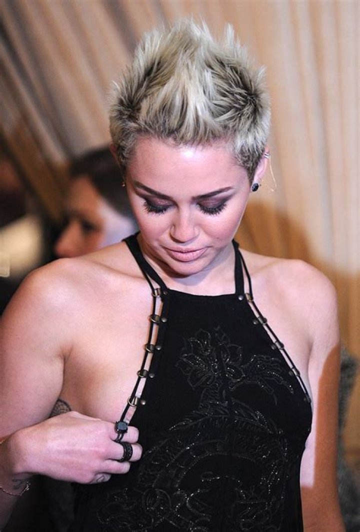 Uncover The Truth Behind Miley Cyrus's Boob Slip: Insights And Revelations